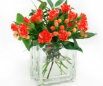 Short glass vase with roses