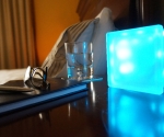 LED light glass block GloBlock on bedside table