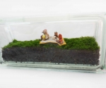 Glass block moss terrarium with teddy bear figurines
