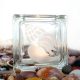Tea light candle holder glass with shell motif