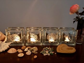 Glass tea light candle holder